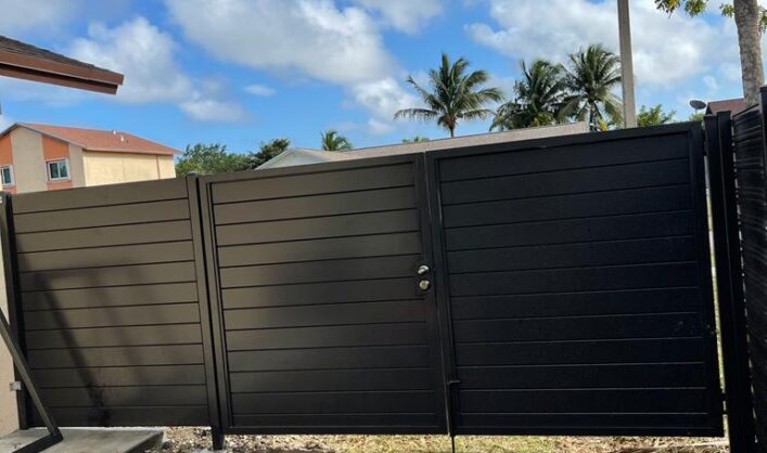 Dura fence horizontal and Aluminum w/ privacy doors