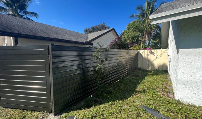 Dura fence horizontal and Aluminum w/ privacy doors