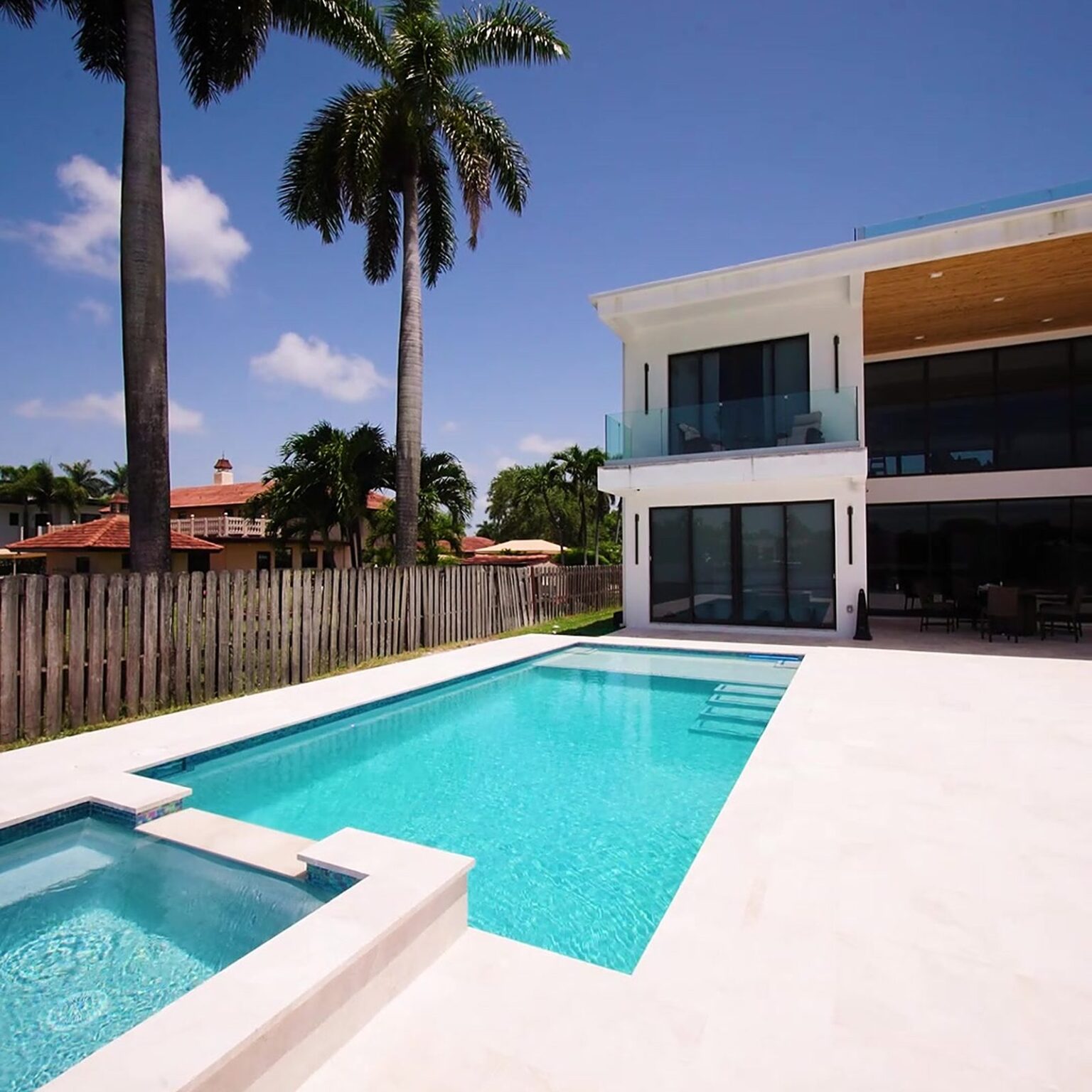 New custom pool and modern two-story home built by Canet Group in South Florida