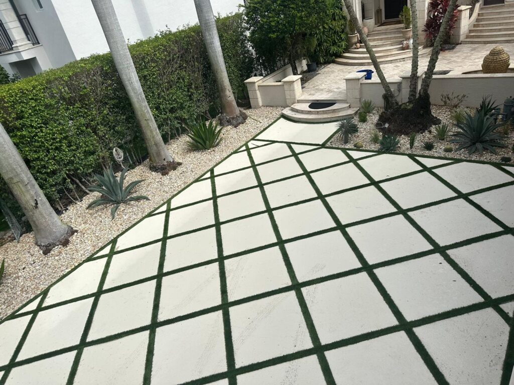 Turf-grid concrete patio installed by Canet Group