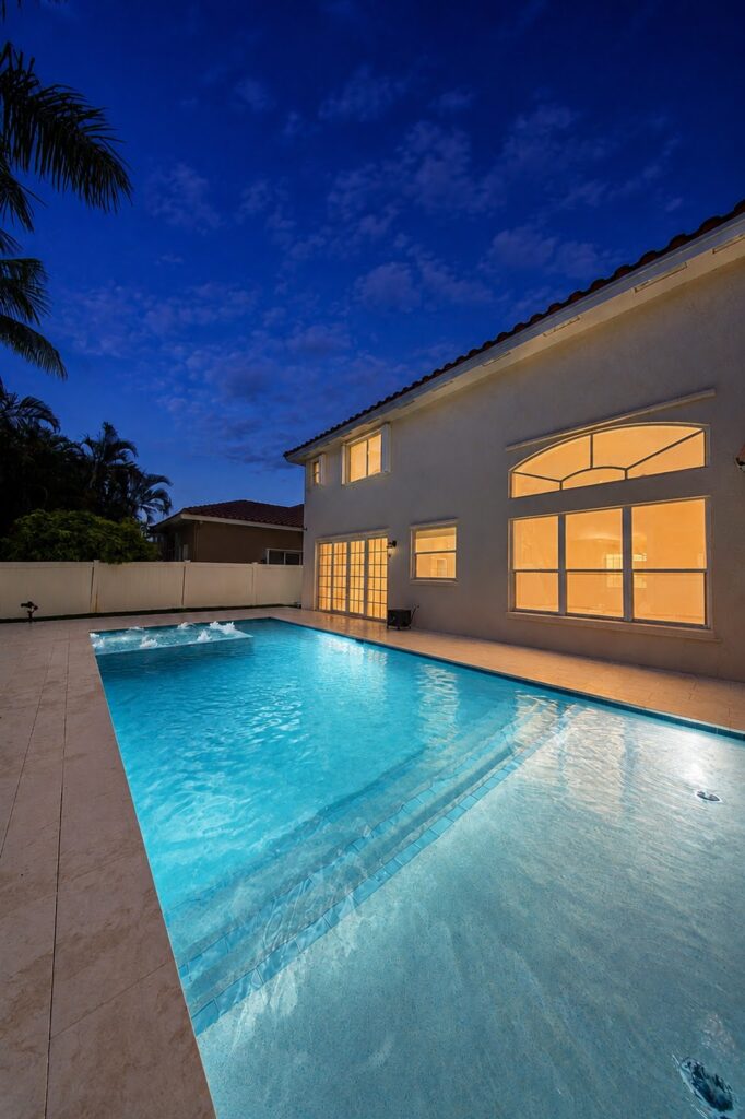 Finished pool with LED lighting glowing at night